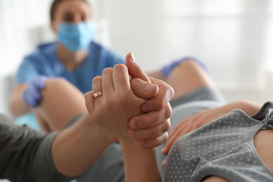 woman giving child birth 