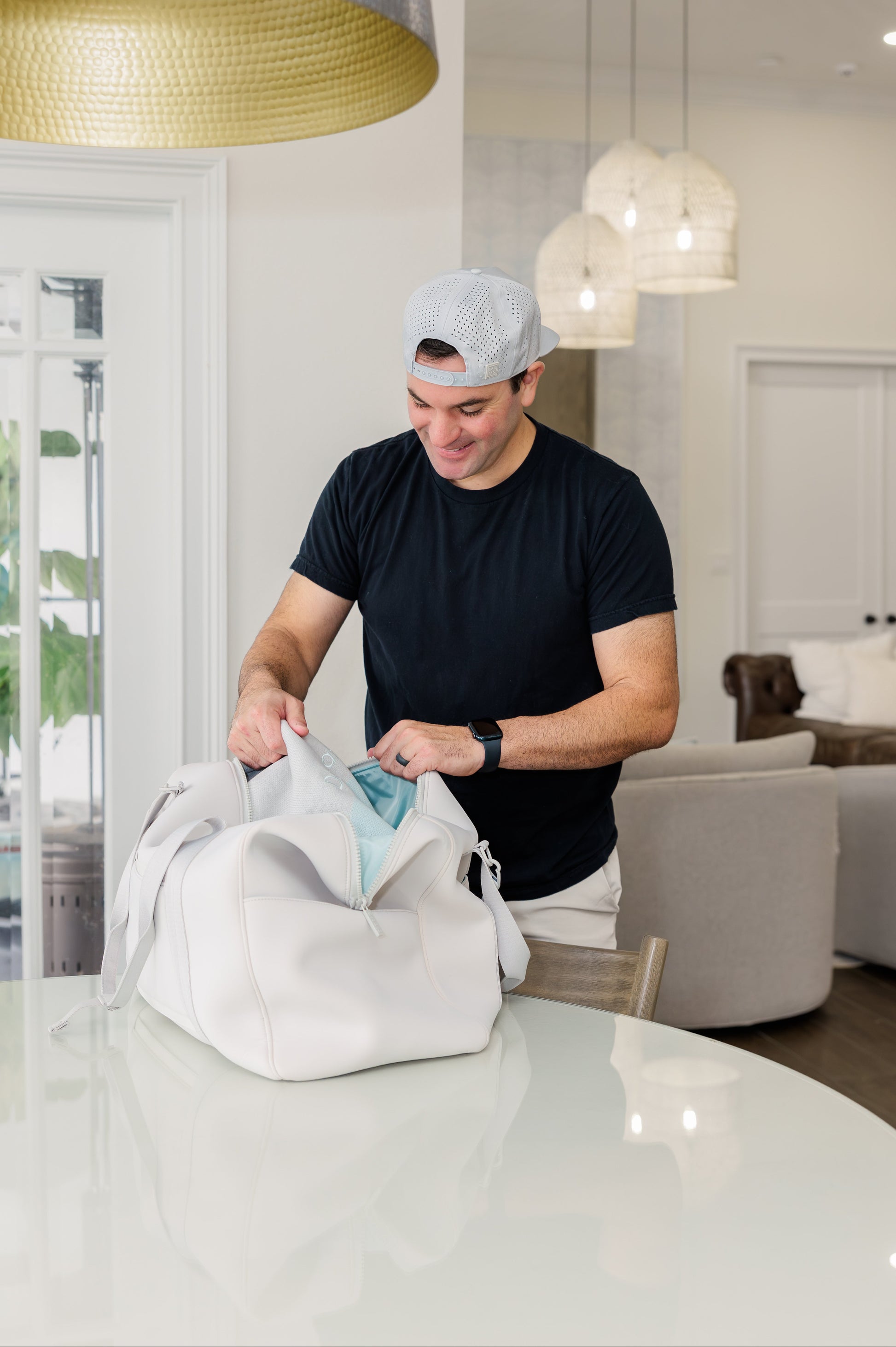 Dad packing his hospital bag for delivery day