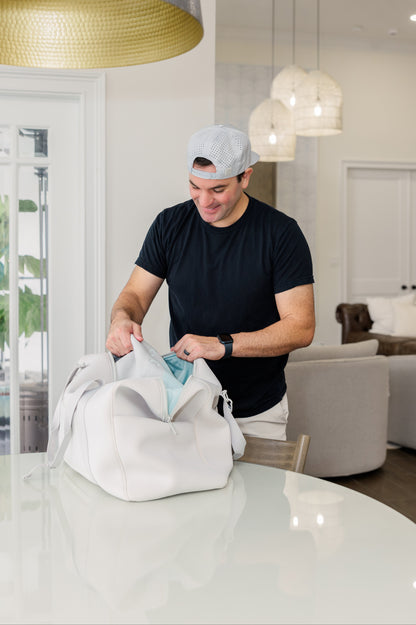 Dad packing his hospital bag for delivery day